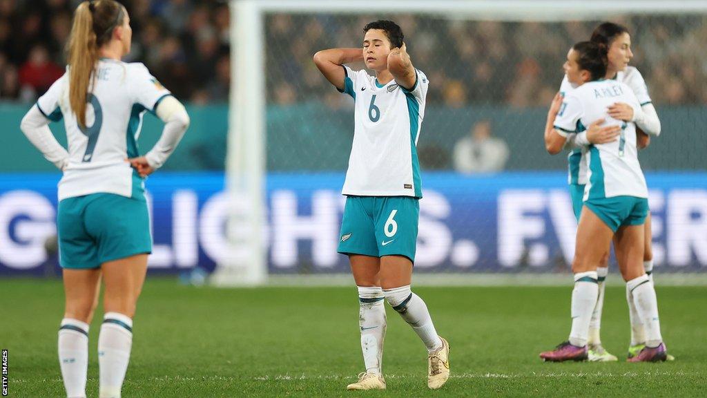 New Zealand's players react after their team's exit from the Fifa Women's World Cup