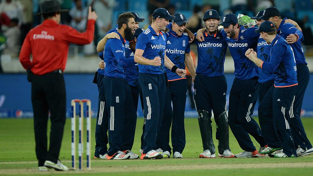 England celebrate taking the final wicket