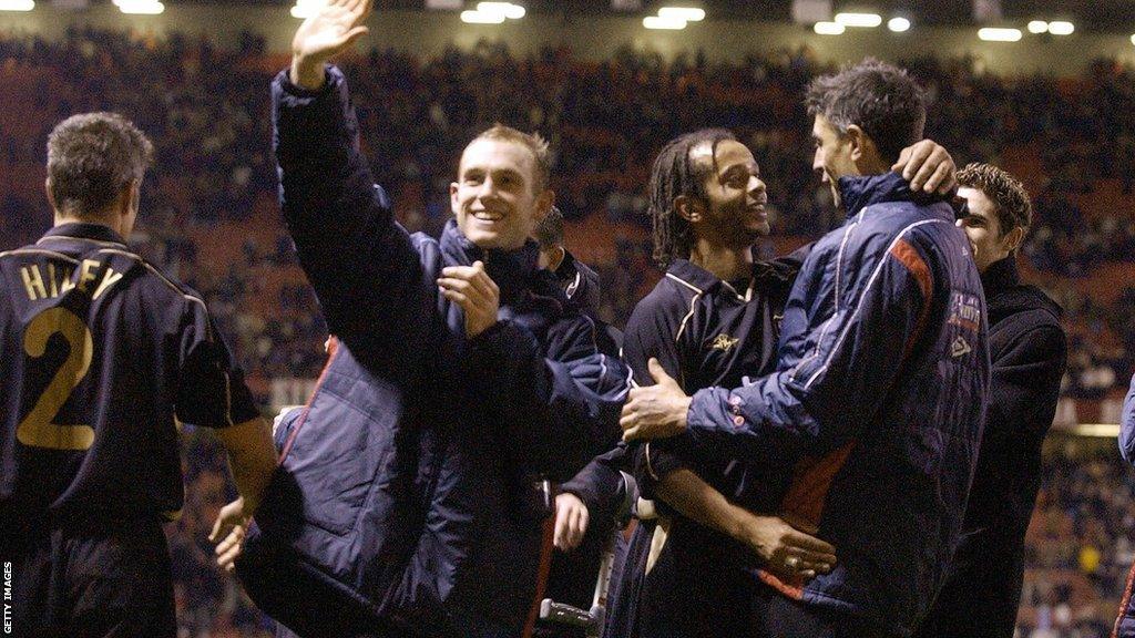 Exeter City celebrate their draw at Manchester United