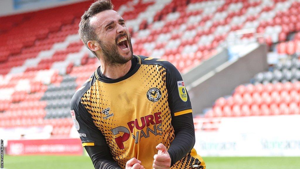 Aaron Wildig celebrates scoring for Newport