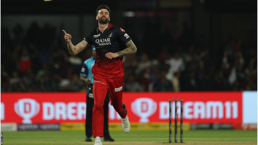 Reece Topley celebrates a wicket for RCB