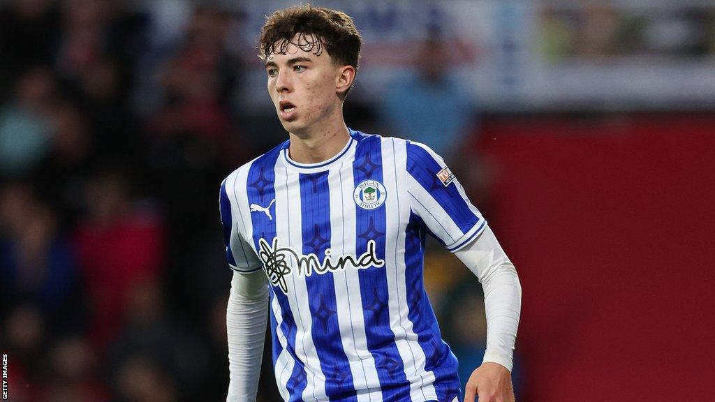 Chris Sze of Wigan Athletic during the Carabao Cup First Round match between Wrexham and Wigan Athletic at Racecourse Ground on August 8, 2023 in Wrexham, Wales. (Photo by Matthew Ashton - AMA/Getty Images)