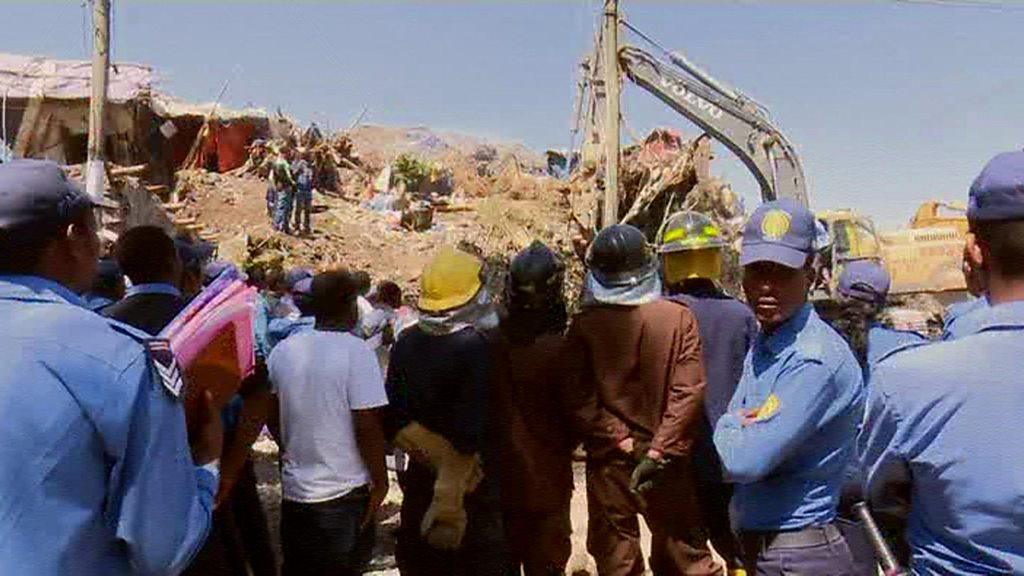 Rescuers and police at the garbage landslide site in Addis Ababa