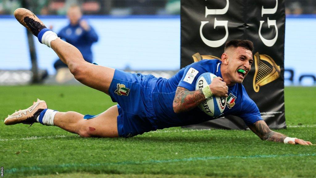 Pierre Bruno shows his delight after scoring Italy's second try