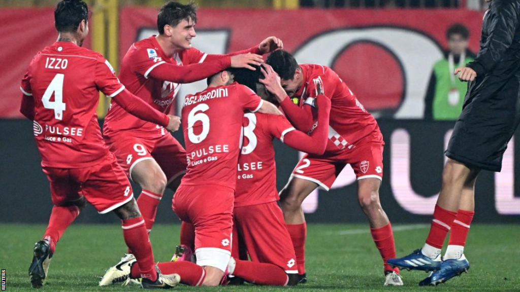 Monza celebrate scoring against AC Milan