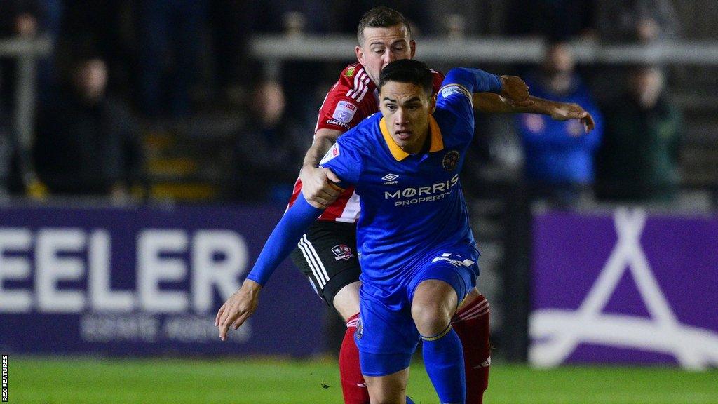 Shrewsbury Town forward Max Mata in action