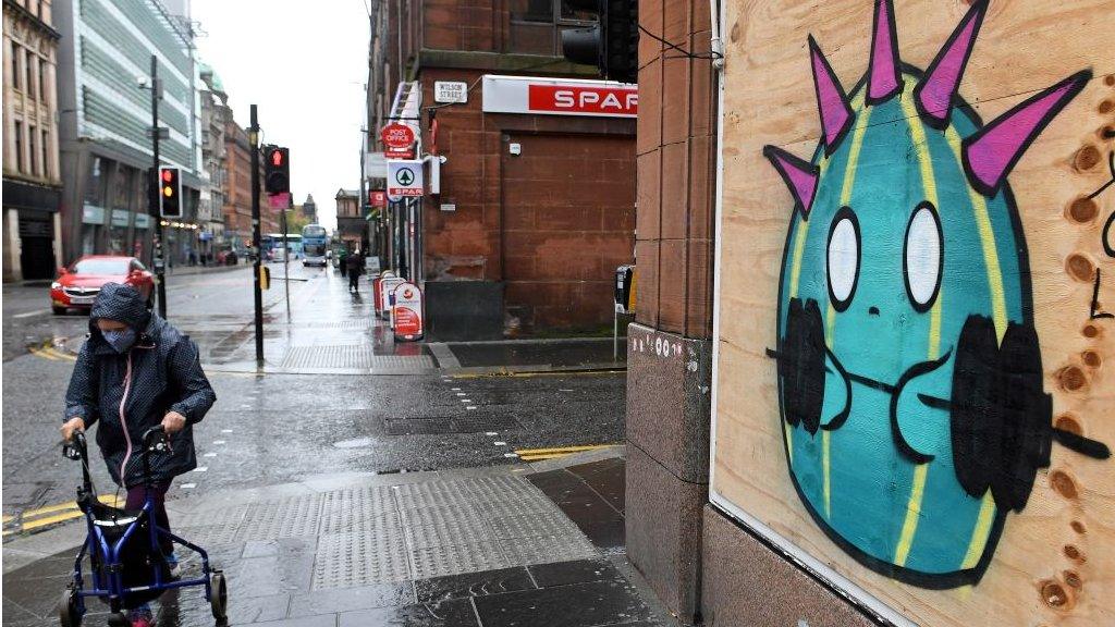 Virus cartoon on Glasgow street