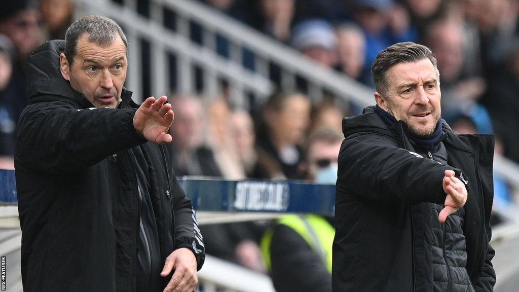 Colin Calderwood and Jon Brady on the touchline