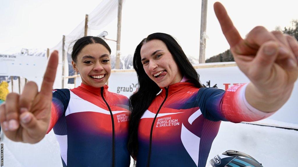 Great Britain bobsledders Kya Placide and Adele Nicoll celebrate gold in St Moritz