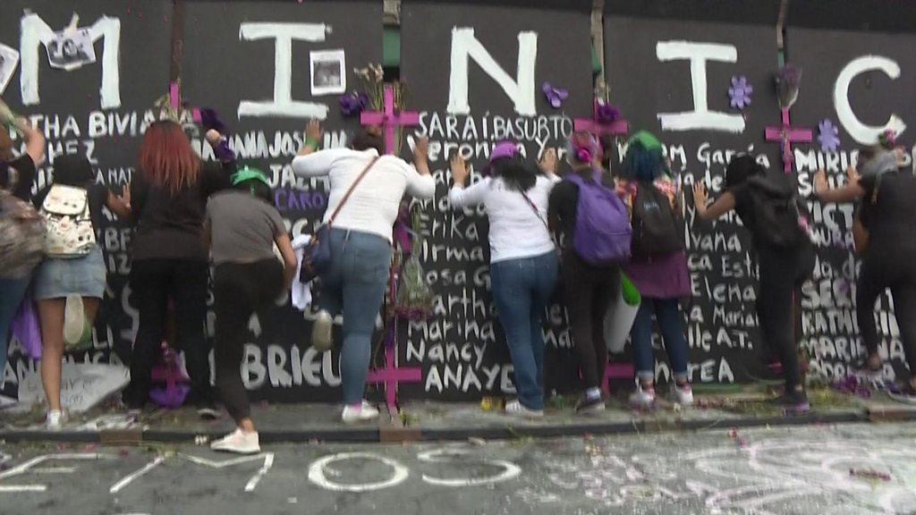 Protesters hit a barricade