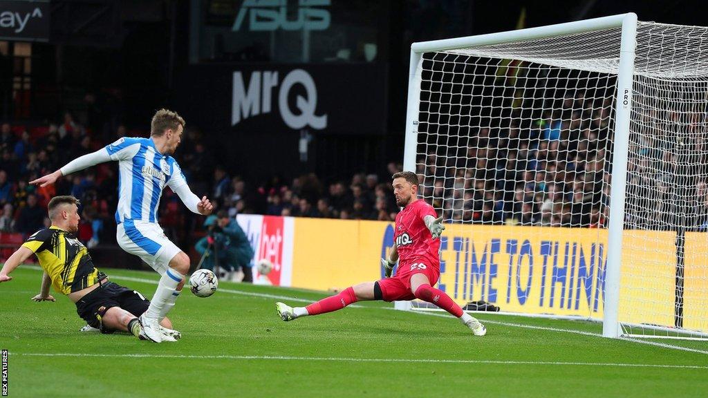 Danny Ward scores his and Huddersfield's second goal against Watford