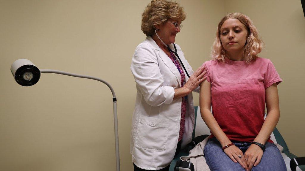 woman getting screening