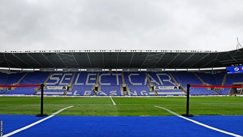 Reading FC's Select Car Leasing Stadium from the touchline on an overcast day in Berkshire.