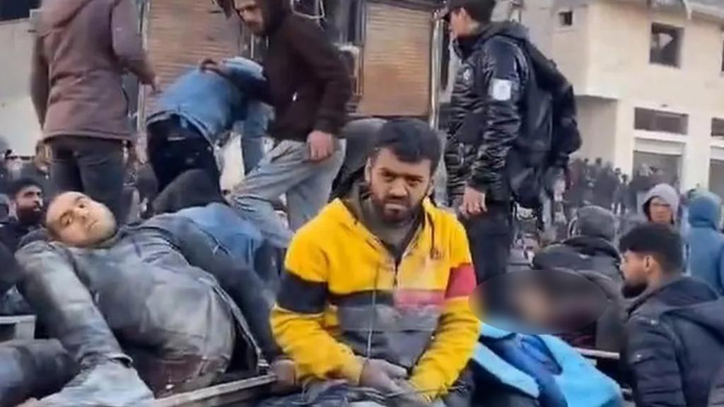 Screengrab of video posted online reportedly showing casualties on a lorry ear Nabulsi roundabout on Rashid Street, south-west of Gaza City (29 February 2024)