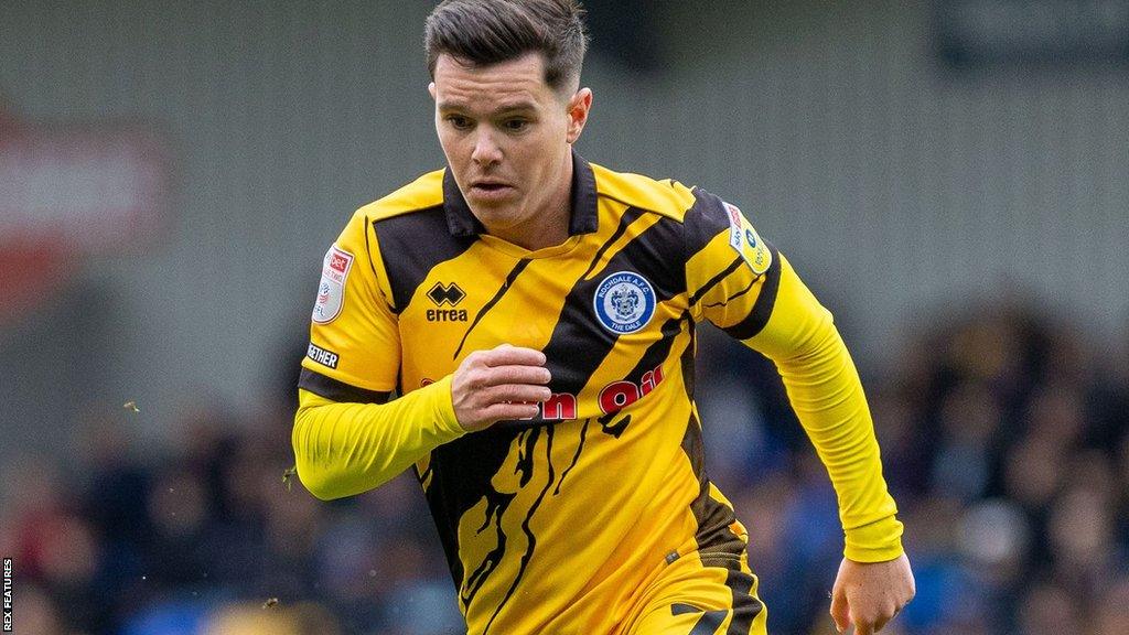 Liam Kelly in action for Rochdale