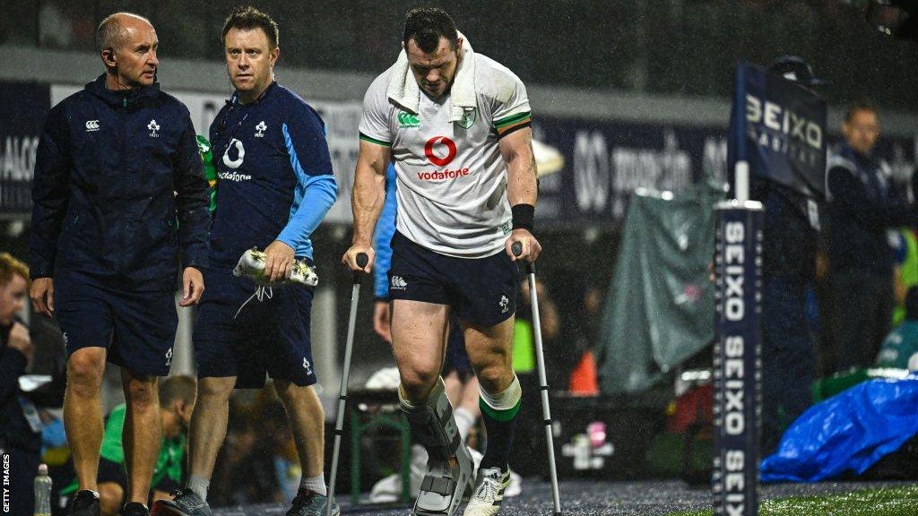 Cian Healy is pictured in crutches after going off injured