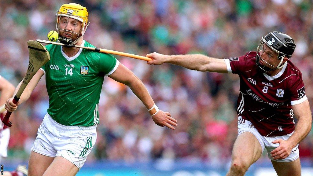 Limerick's Seamus Flanagan attempts to burst away from Galway's Sean Linnane at Croke Park