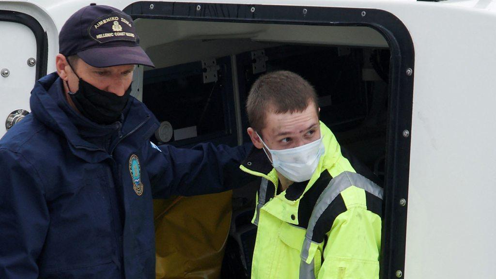 Ferry fire survivor on Greek coastguard boat