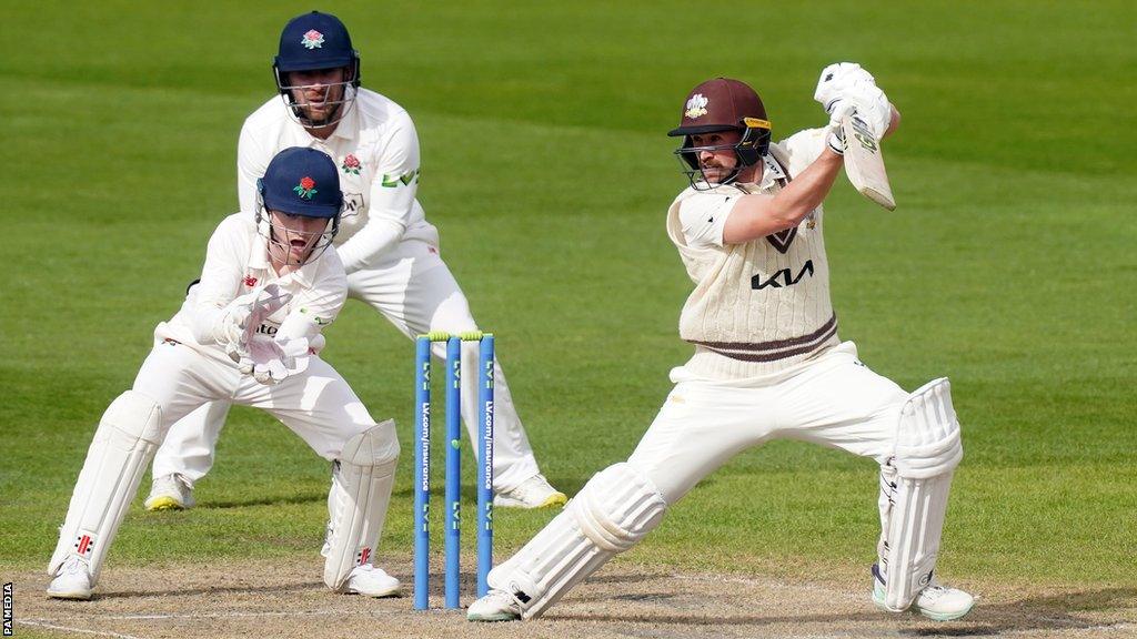 Cameron Steel (right) batting for Surrey against Lancashire