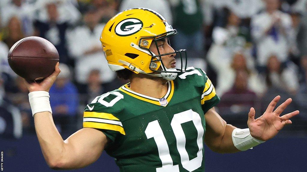 Jordan Love of the Green Bay Packers throws a pass against the Dallas Cowboys during the second quarter of the NFC Wild Card Playoff game at AT&T Stadium