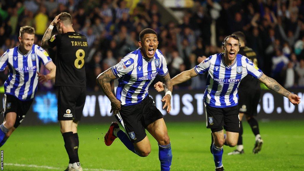 Liam Palmer celebrates his last-gasp equaliser against Peterborough which sent the game to extra time