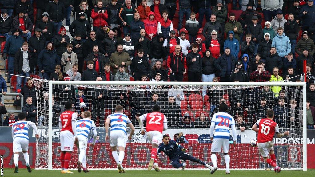 Jordan Hugill scores a penalty for Rotherham against QPR