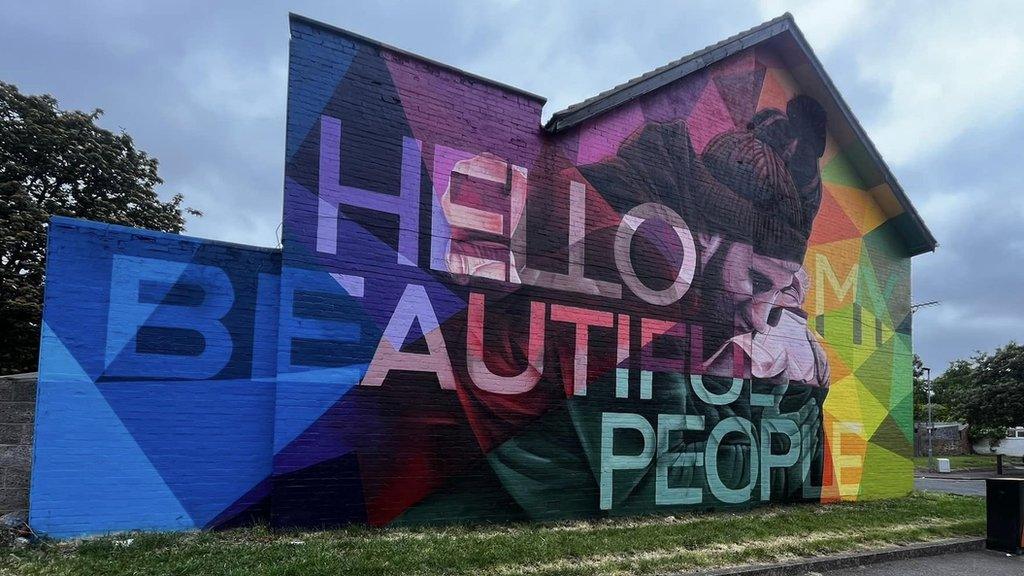 Colourful mural on side of house