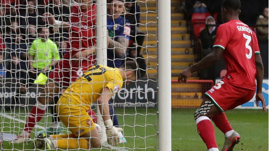 An image of the ball appearing to be over the line before Aden Flint's effort was saved