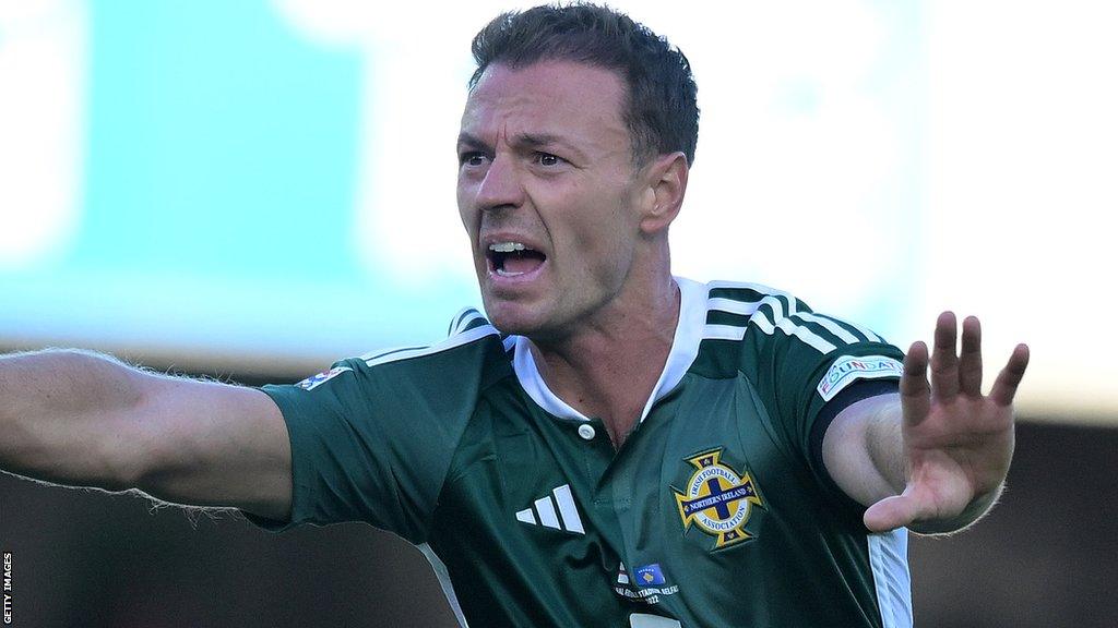 Jonny Evans marshals the defence during a Northern Ireland match