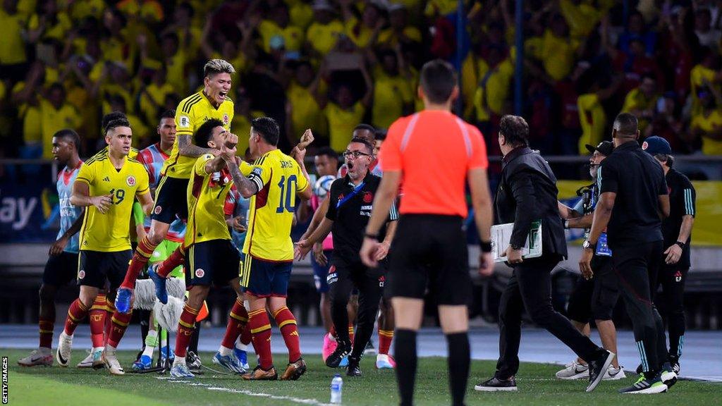 Luis Diaz celebrates with team-mates