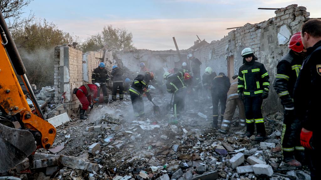 Rescuers work at the site of a military strike in the village of Hroza, Kupiansk district, Kharkiv region, northeastern Ukraine, on 5 October 2023, amid the Russian invasion