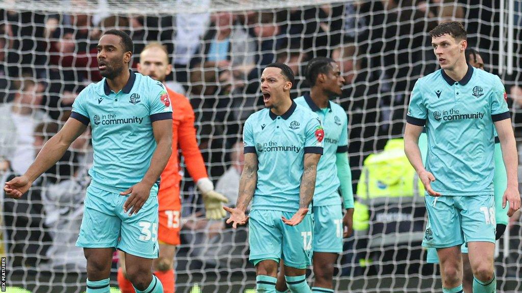 Bolton players during the 1-0 defeat to Derby