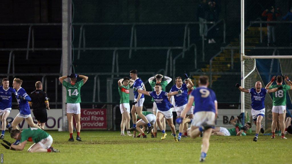 Naomh Conaill players celebrate their dramatic match-winning goal as the Gowna men show their devastation