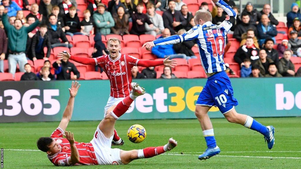 Barry Bannan (right) was sent off in the first half of Sheffield Wednesday's defeat by Bristol City