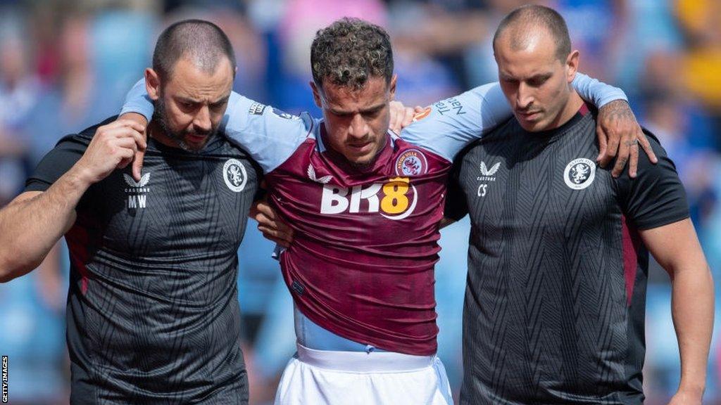 Philippe Coutinho is helped off the pitch after picking up an injury in a 4-0 win against Everton