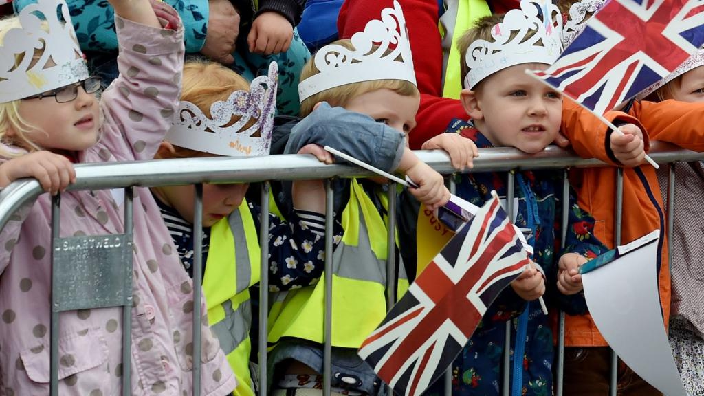 Children waving flags