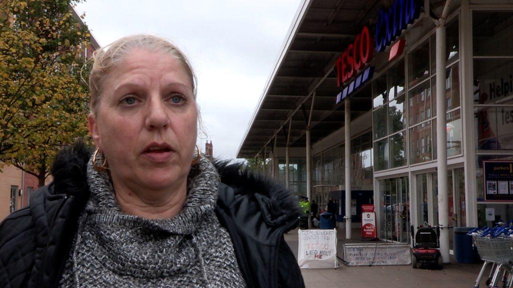 Woman outside Tesco