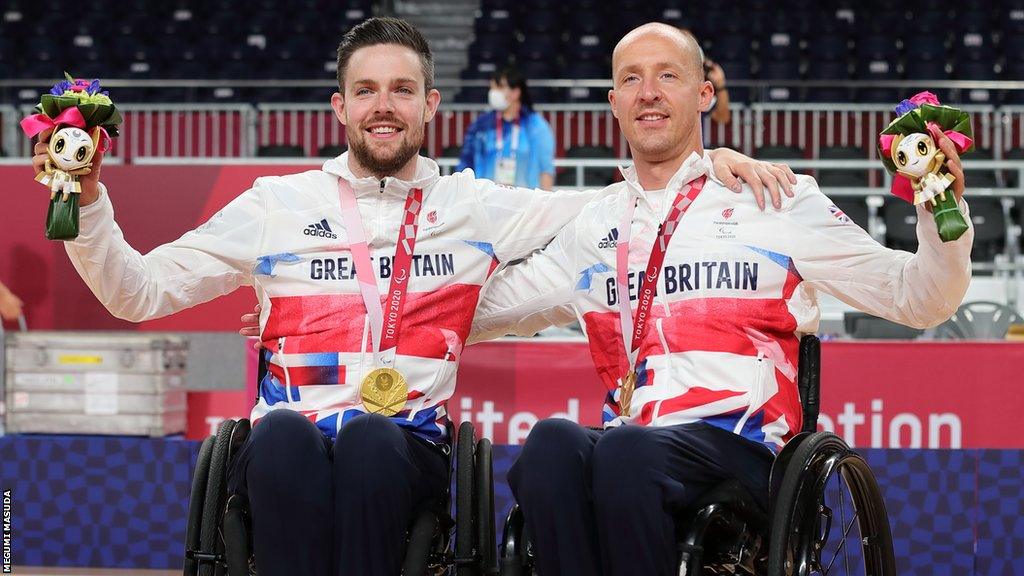 GB co-captains Chris Ryan and Gavin Walker celebrate gold at the Tokyo Paralympics