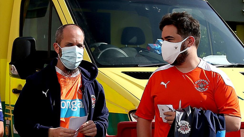 Blackpool fans in masks