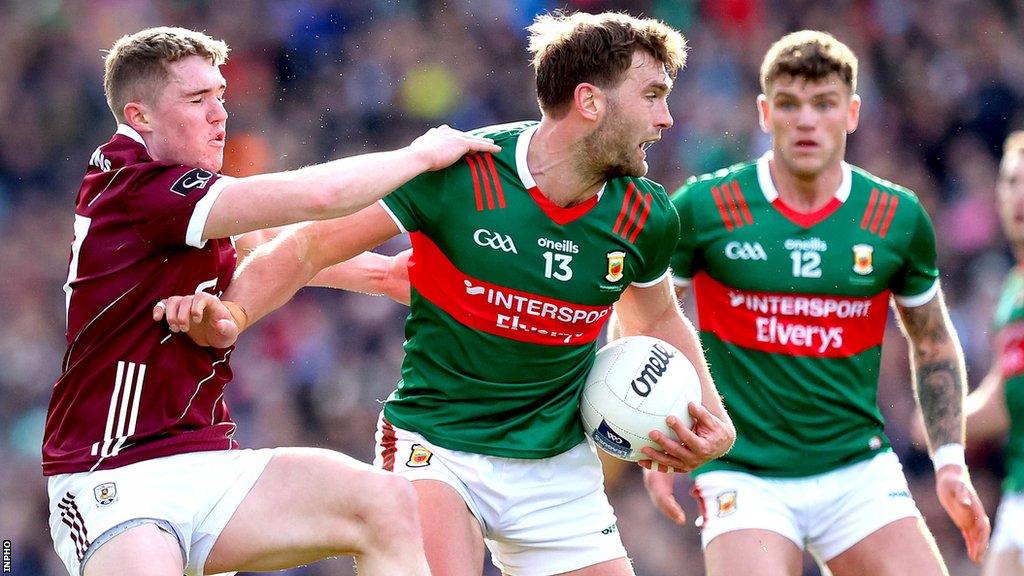 Galway's Jack Glynn battles with Mayo's Aidan O'Shea in this year's League Final