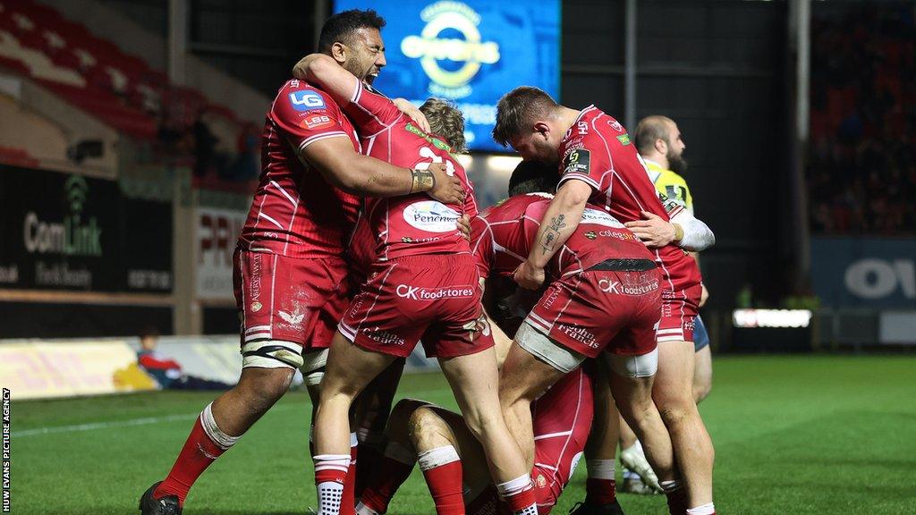 Scarlets players celebrate the quarter-final victory against Clermont