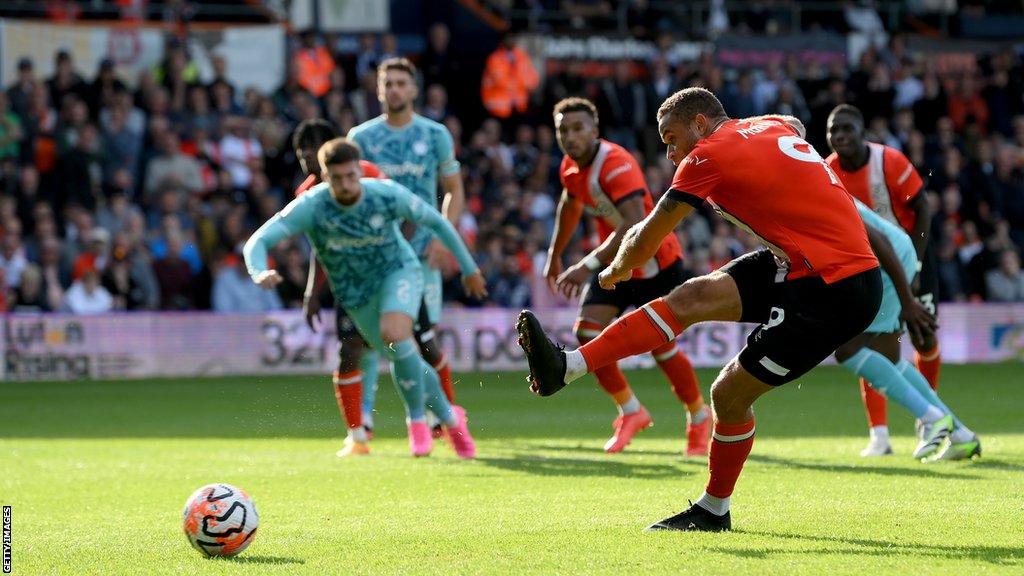 Carlton Morris scores a penalty for Luton