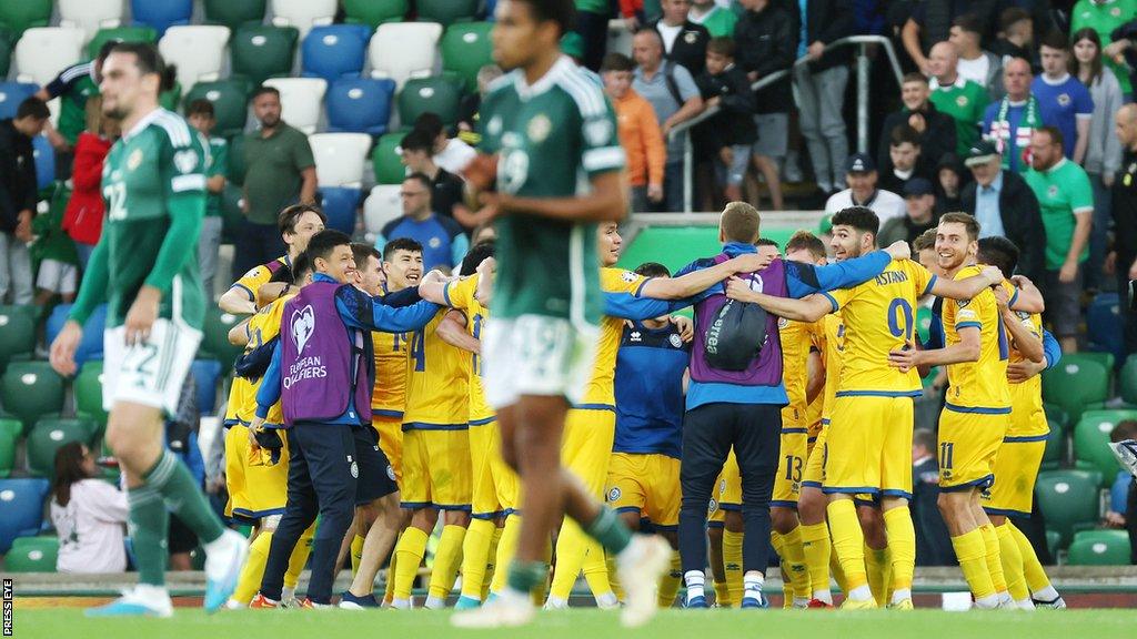 Kazakhstan celebrate Abat Aimberov's winning goal at Windsor Park