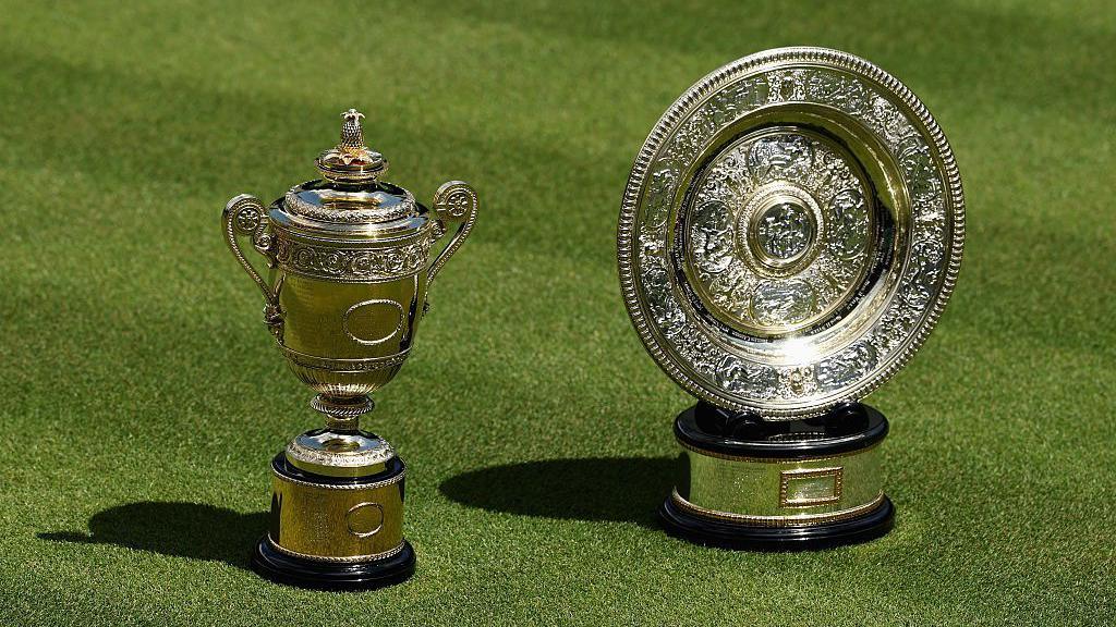The men's and women's Wimbledon trophies