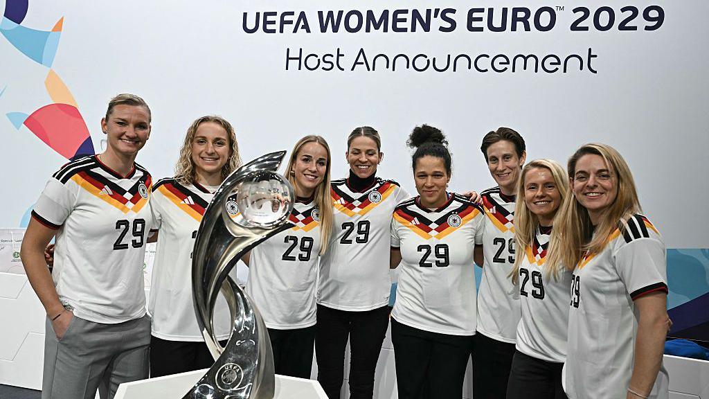 German delegation with the women's Euros trophy.