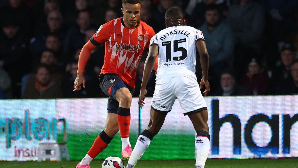 Carlton Morris (left) in action for Luton Town against Middlesbrough