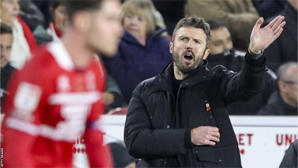 Michael Carrick gestures to his players during a Middlesbrough game