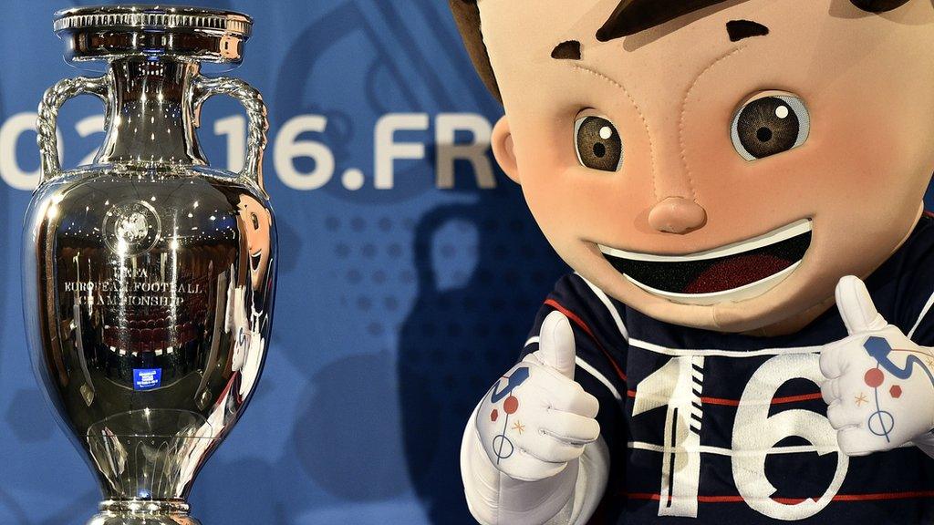 Euro 2016 mascot with Henri Delaunay cup