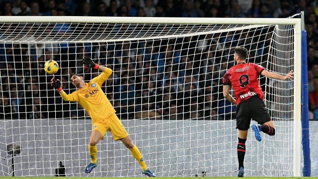 AC Milan striker Olivier Giroud scores against Napoli