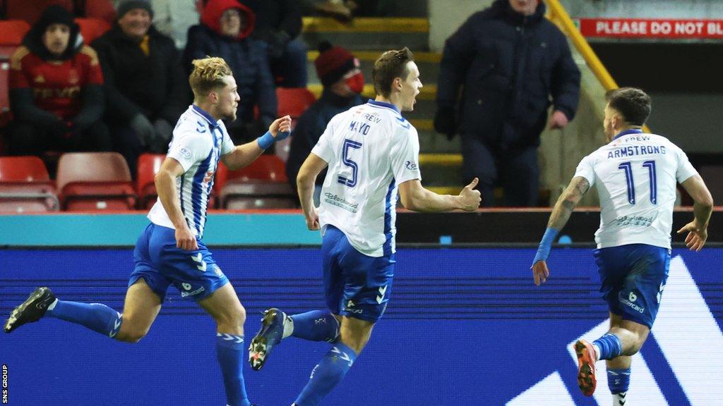 Kilmarnock's David Watson (left) celebrates after scoring to make it 1-0 to Kilmarnock during a cinch Premiership match between Aberdeen and Kilmarnock at Pittodrie Stadium